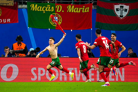 Francisco Conceicao celebrates after scoring a goal